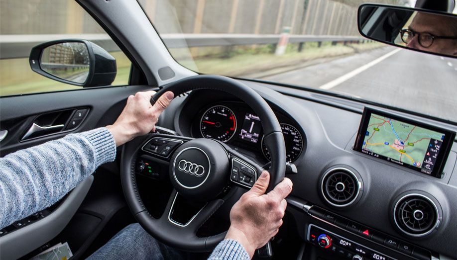Man Driving a Car