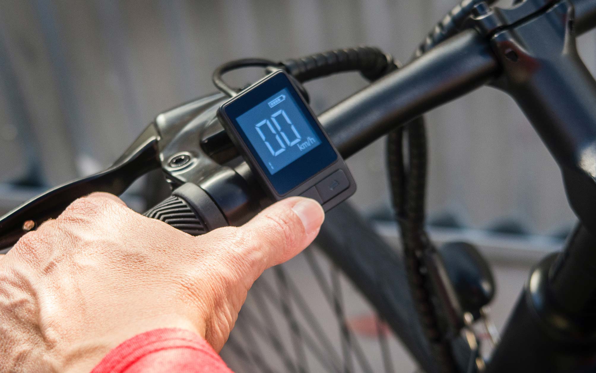 Man Holding Electric Bike Handlebar