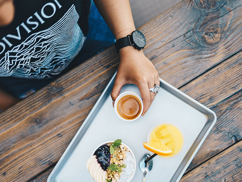 Person Sitting with Breakfast Tray