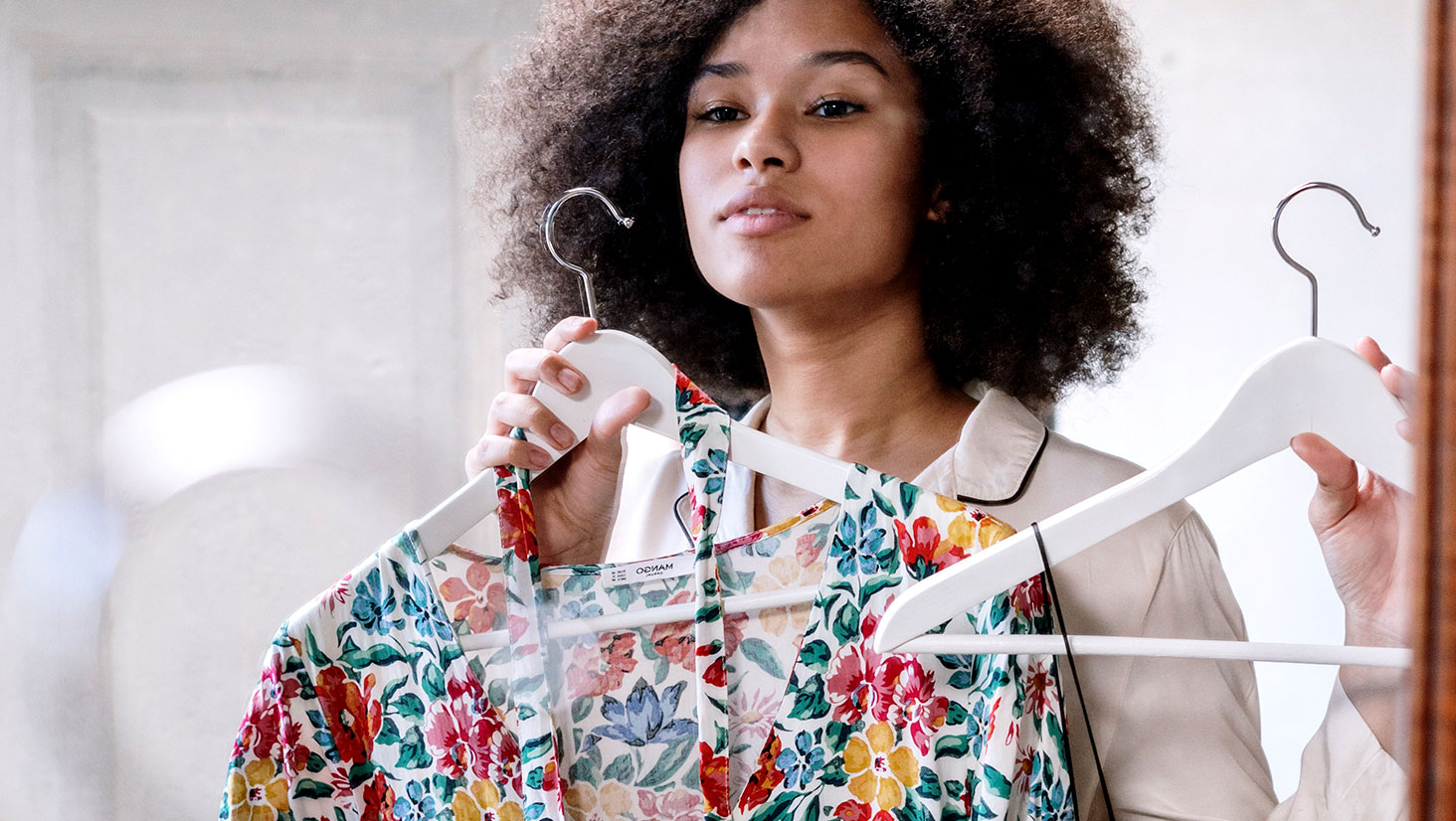 Woman Looking at Clothes